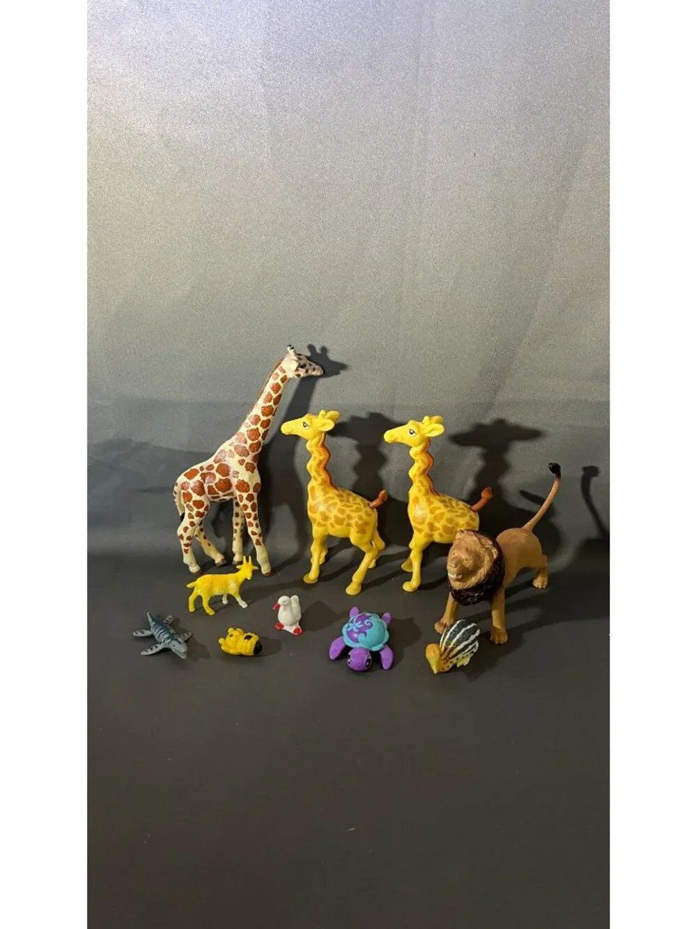 Assorted Animal Figurines Lot Includes Giraffes Lion Shark Goat Bee & More